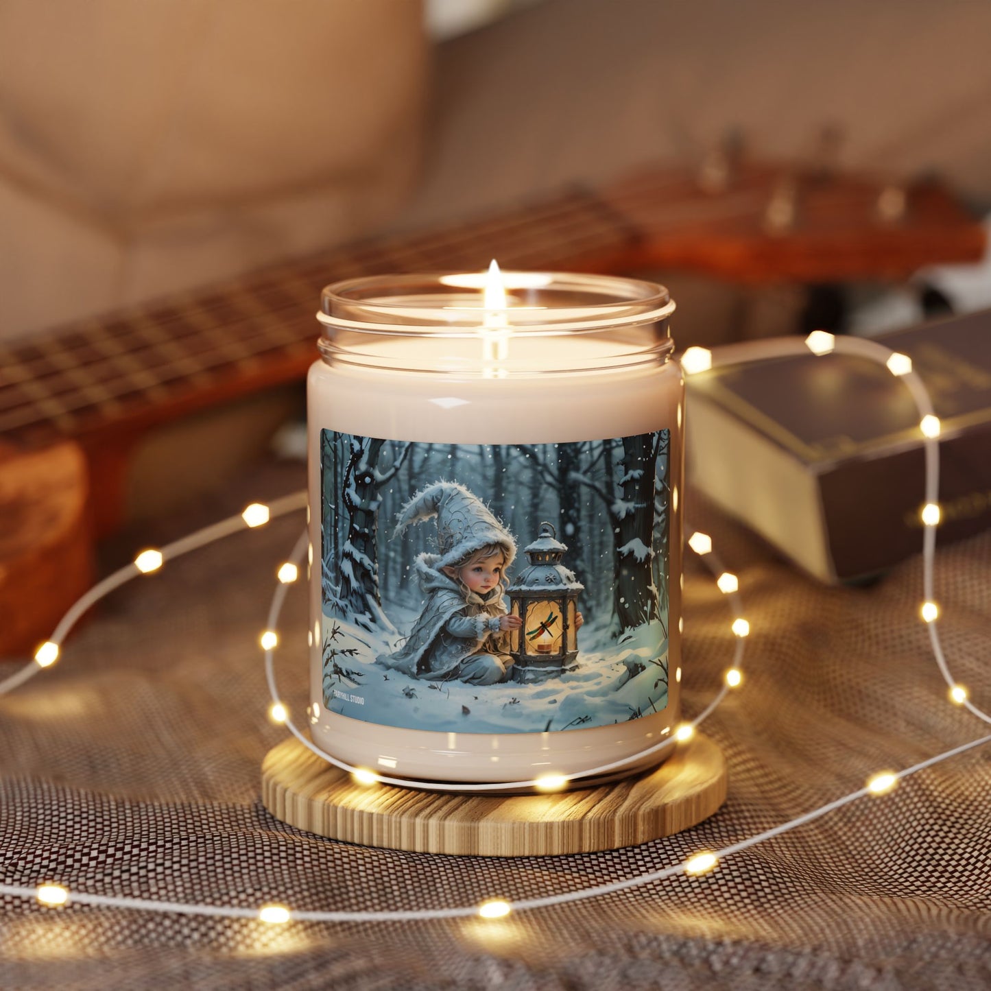 Soy Candle magical holiday art featuring a Lovely Elf with Dragonfly lantern in winter snow